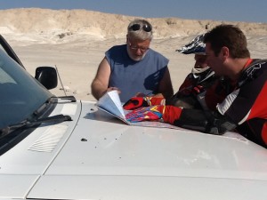 Ofer, Matan and Nimrod discussing the route to camp.