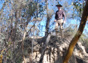 Andrew atop a hidden well at The Pimple.