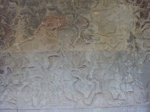 This detailed artwork extends for many metres along the walls of a walkway.