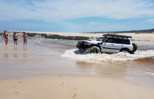 Graham takes his Patrol though the Warren River.