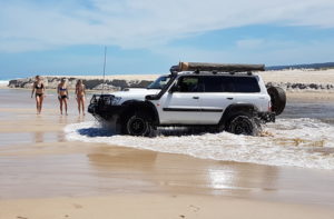 Graham takes his Patrol though the Warren River.