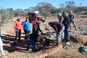 Scott cleaning out the waterhole.