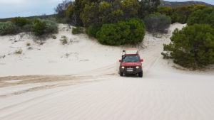 Scott up onto dunes.