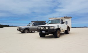 John's Tucson and my Patrol at the start of the dunes.