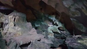 Directional signage deep inside the cave.