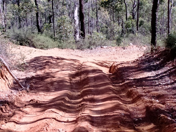 Rutted section of track on the descent to the river.